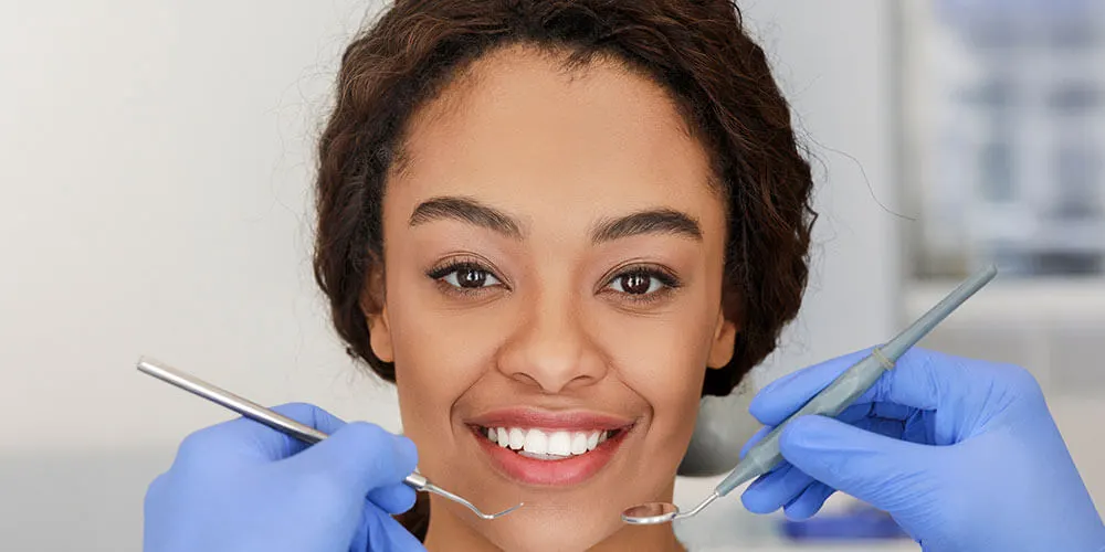 Smile Bright: Choosing Between Bonding, Veneers, and Whitening